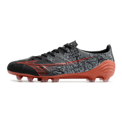 Botas de fútbol de campo Mizuno Alpha FG negras y rojas