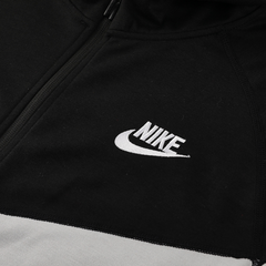 Conjunto chaqueta y pantalón para clima frío de Nike en negro y gris