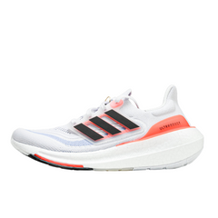 Zapatillas Adidas Ultraboost Light en blanco y naranja