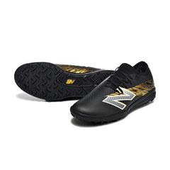 Chuteira Society TF New Balance Furon V8 Elite Preta e Dourada