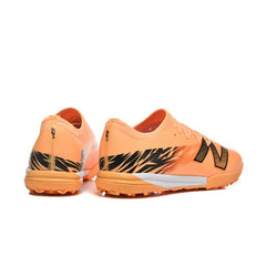 Chuteira Society TF New Balance Furon V8 Elite Laranja