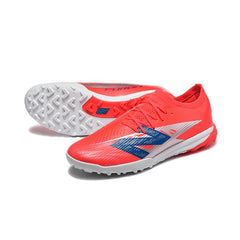 Chuteira Society TF New Balance Furon V8 Elite Rosa e Prateada