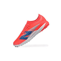 Chuteira Society TF New Balance Furon V8 Elite Rosa e Prateada