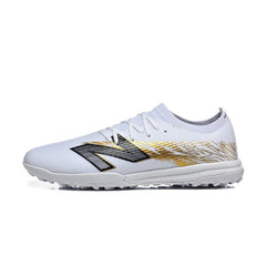 Chuteira Society TF New Balance Furon V8 Elite Branca e Dourada
