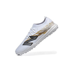Chuteira Society TF New Balance Furon V8 Elite Branca e Dourada