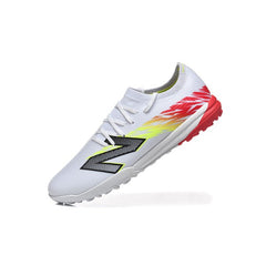 Chuteira Society TF New Balance Furon V8 Elite Branca, Amarela e Vermelha