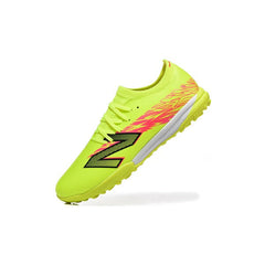 Chuteira Society TF New Balance Furon V8 Elite Amarela e Rosa