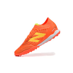 Chuteira Society TF New Balance Tekela Elite V5 Laranja