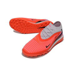 Chuteira Society TF Nike Phantom 6 Elite Laranja, Branco e Rosa