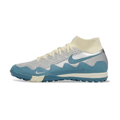 Chuteira Society TF Nike x Patta Zoom Mercurial Superfly Elite Branco, Azul e Prateado Kids