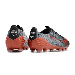 Botas de fútbol de campo Mizuno Alpha FG negras y rojas