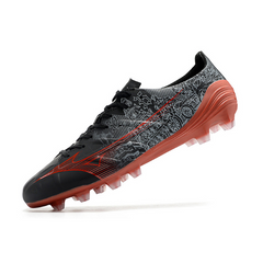 Botas de fútbol de campo Mizuno Alpha FG negras y rojas