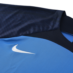 Conjunto de camiseta y pantalón corto azul Nike