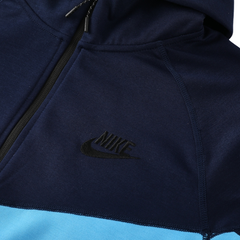 Conjunto de chaqueta y pantalón para clima frío de Nike en azul oscuro y azul claro