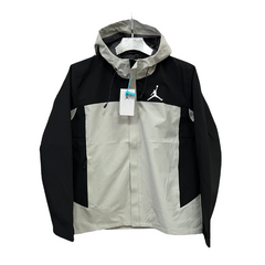 Chaqueta cortavientos Jordan negra y gris