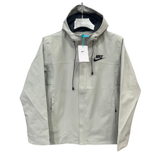 Cortavientos Nike gris