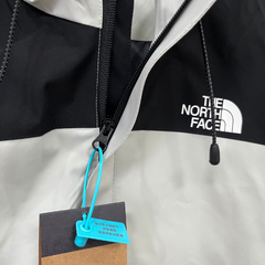 Cortavientos The North Face gris y negro