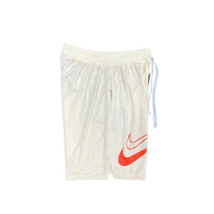 Pantalones cortos Nike en color beige y rojo