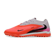Chuteira Society TF Nike Phantom 6 Elite Laranja, Branco e Rosa